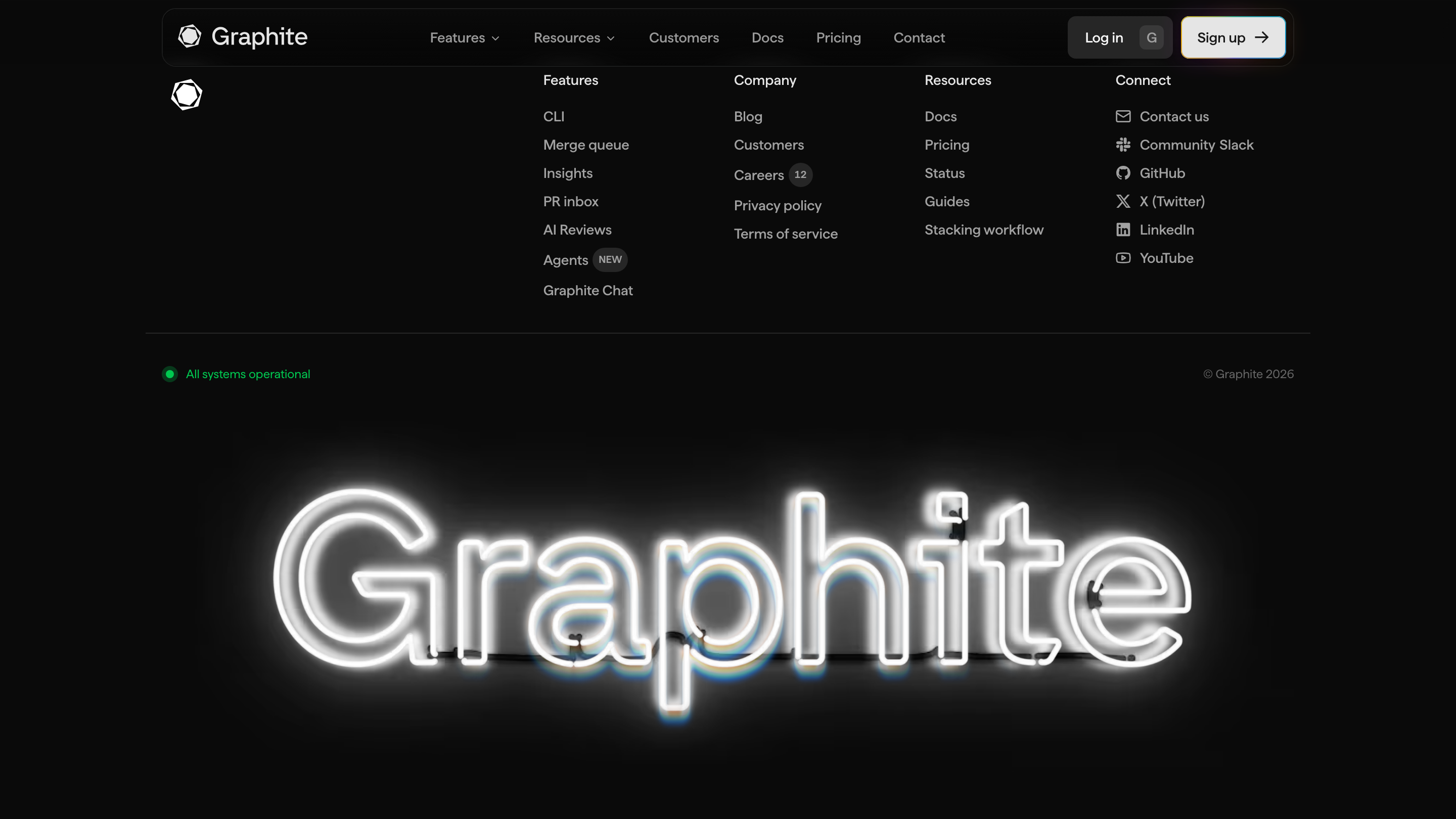 Graphite homepage scrolled to the footer with the holographic Graphite mark